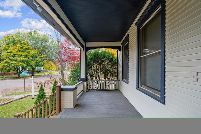 wooden deck featuring a porch