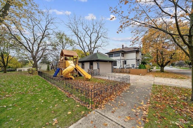 exterior space featuring a playground and a lawn