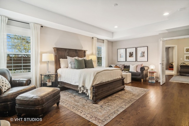 bedroom featuring dark hardwood / wood-style flooring