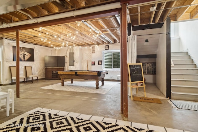 recreation room with billiards, concrete flooring, and electric panel