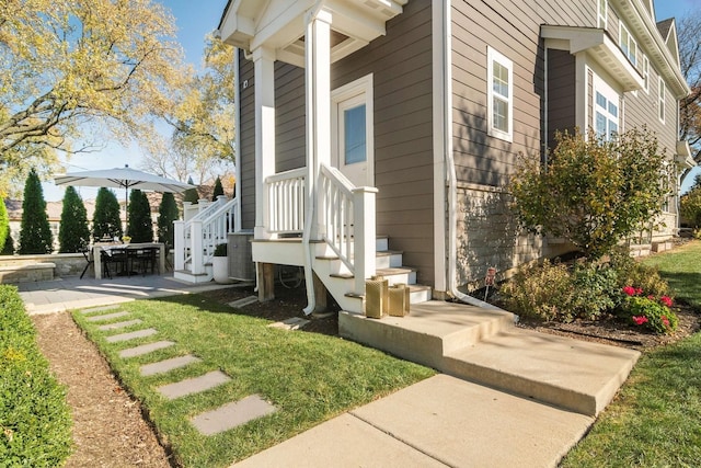 view of home's exterior with a patio