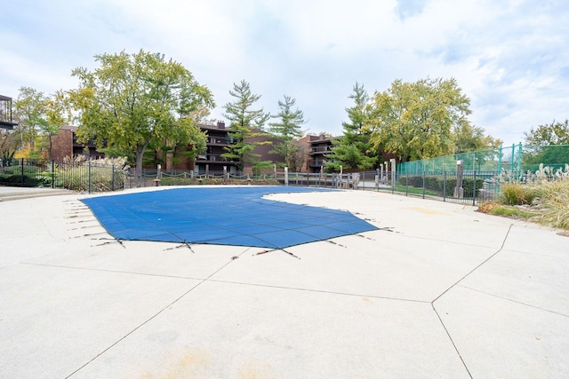 view of swimming pool with a patio