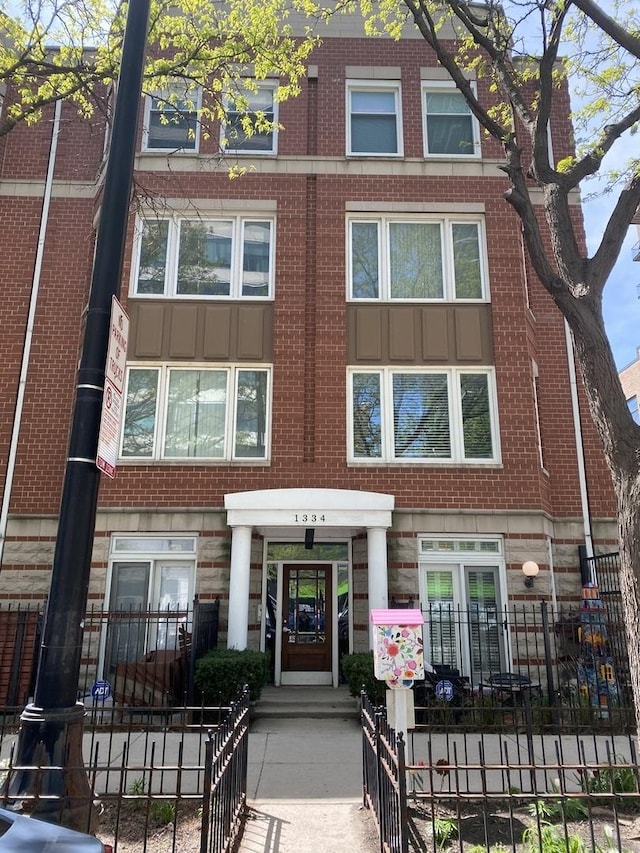 1334 S Wabash Ave Unit B, Chicago, IL 60605 - view of front of house featuring brick siding and stone siding