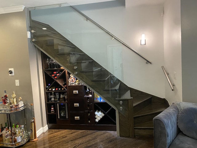 1334 S Wabash Ave Unit B, Chicago, IL 60605 - wine cellar with a bar, wood finished floors, ornamental molding, and baseboards
