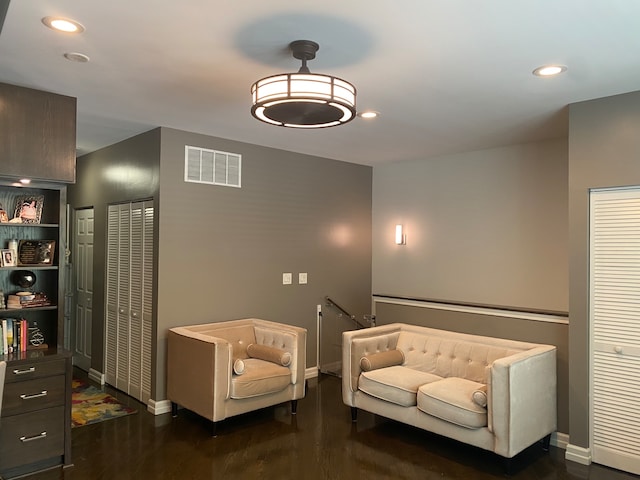 living area with dark wood-type flooring