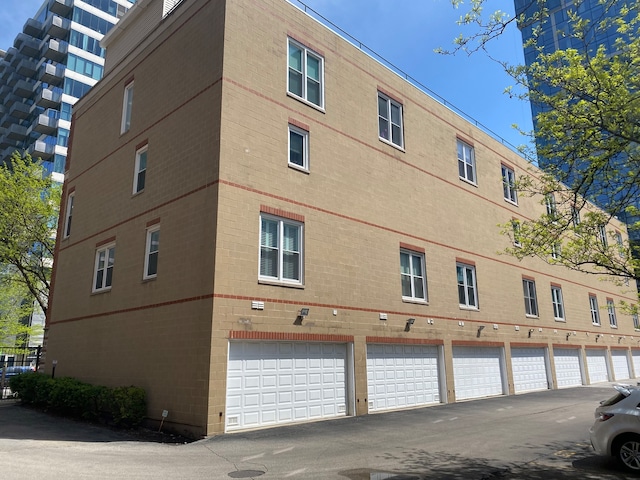 view of building exterior with a garage