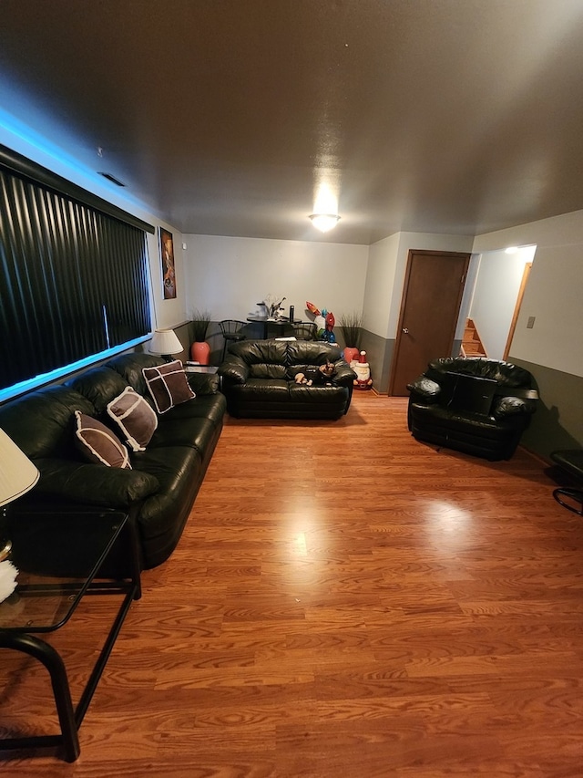 living room featuring wood-type flooring