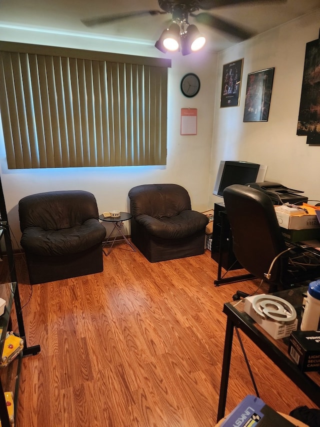 home office featuring ceiling fan and light wood-type flooring