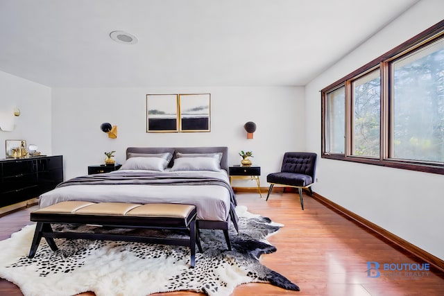 bedroom featuring hardwood / wood-style flooring