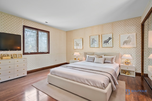 bedroom featuring hardwood / wood-style floors