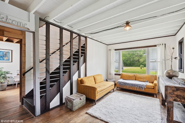 interior space with beamed ceiling, wood ceiling, and hardwood / wood-style flooring