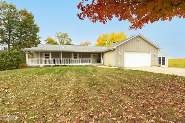 ranch-style home with a front yard and a garage