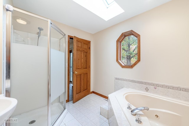 bathroom with a skylight, tile patterned flooring, and plus walk in shower