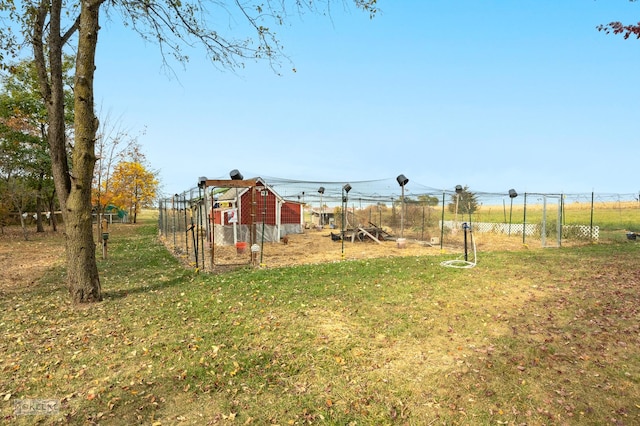 view of yard with a rural view