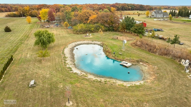 bird's eye view with a water view and a rural view