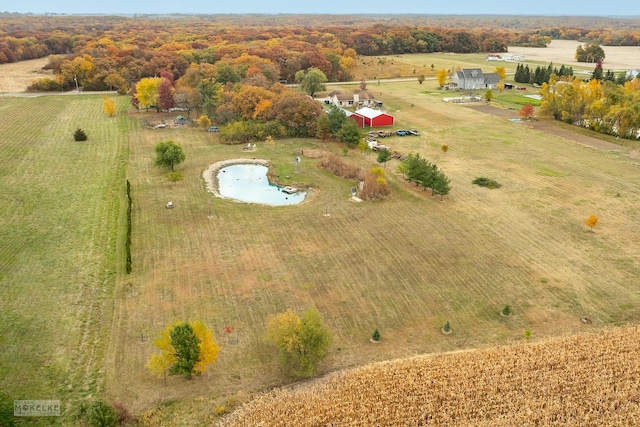 birds eye view of property featuring a rural view