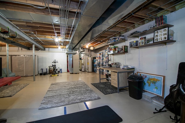 basement featuring heating unit and gas water heater