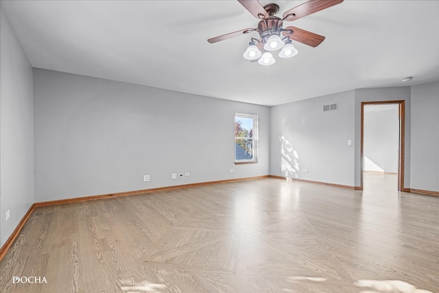 unfurnished room featuring light wood-type flooring and ceiling fan