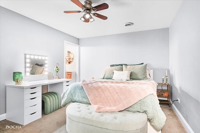 carpeted bedroom featuring ceiling fan