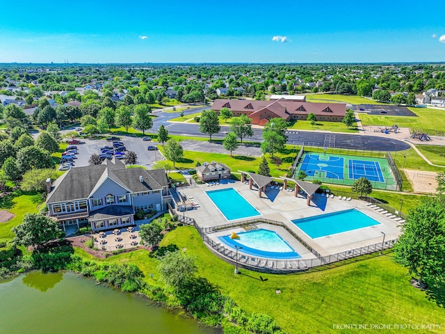 drone / aerial view featuring a water view