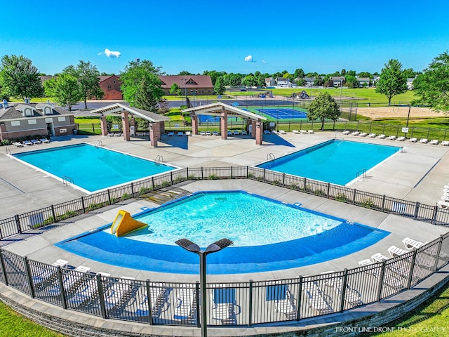 view of swimming pool featuring a patio