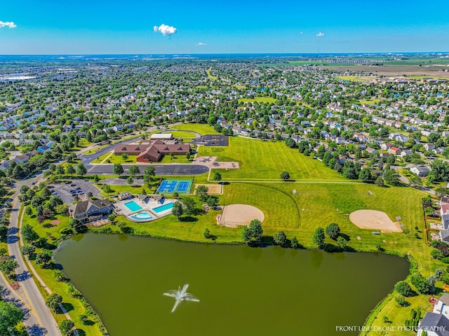 bird's eye view with a water view