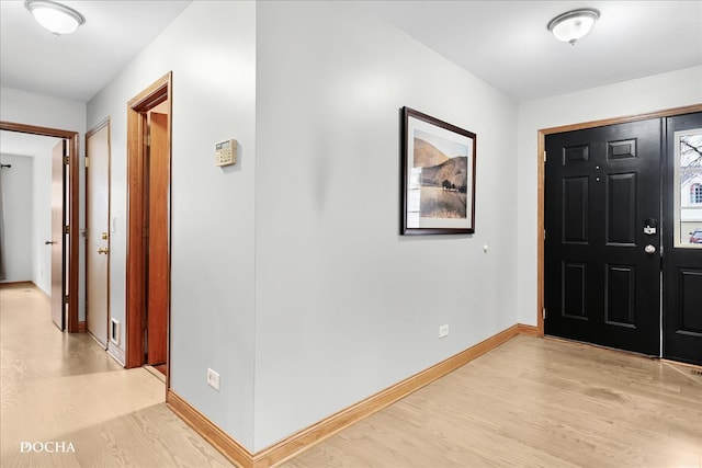 entrance foyer featuring light hardwood / wood-style floors