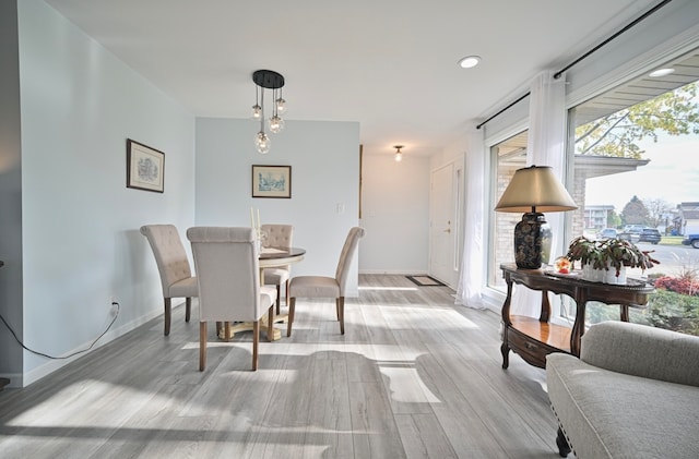 dining room with light wood-type flooring