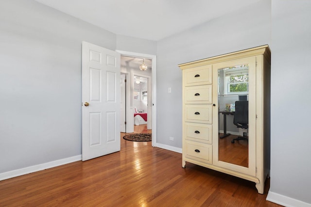 unfurnished bedroom with wood-type flooring