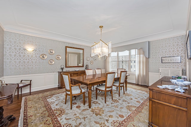 dining room featuring light hardwood / wood-style flooring and a chandelier