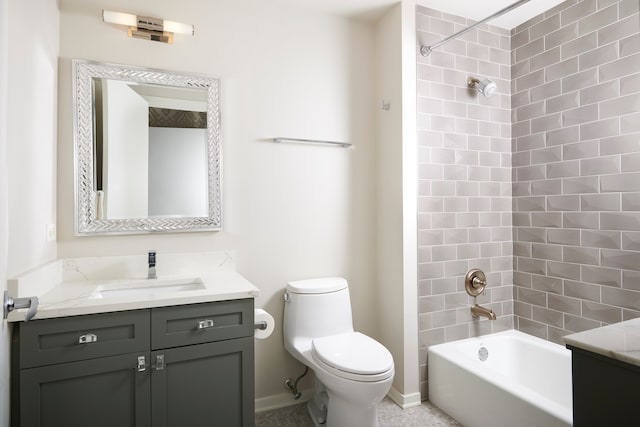 full bathroom featuring vanity, toilet, and tiled shower / bath