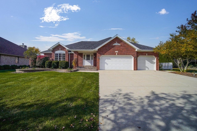 single story home with a garage and a front lawn