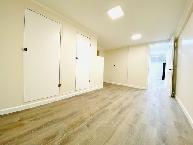 spare room featuring light hardwood / wood-style floors