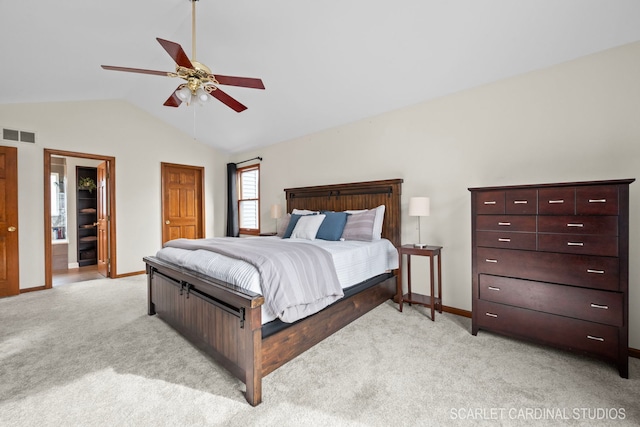 carpeted bedroom featuring lofted ceiling and ceiling fan