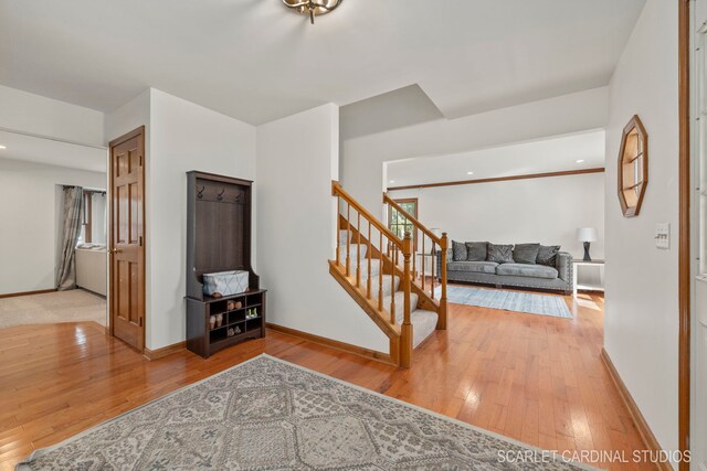 carpeted living room with a brick fireplace