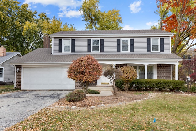 view of front property featuring a front yard