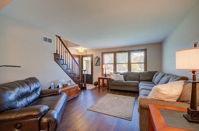 living room with dark wood-type flooring