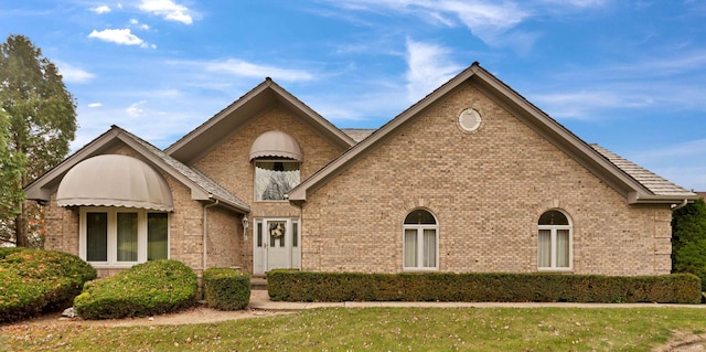 view of property with a front lawn