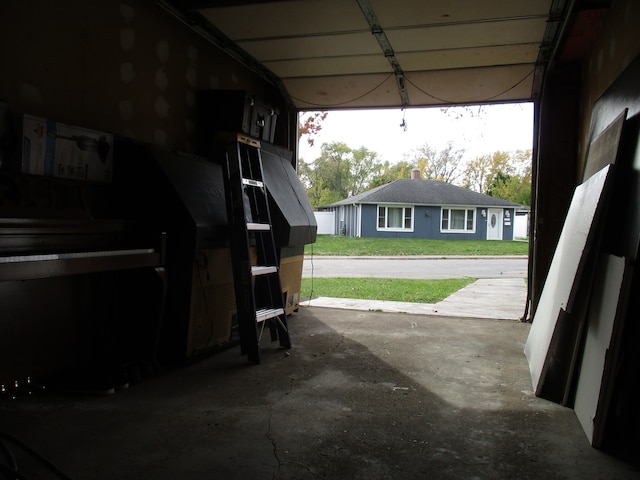 garage with a yard