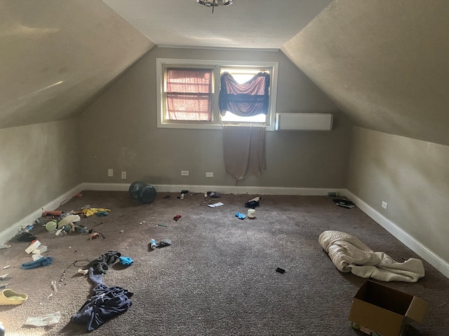 bonus room with vaulted ceiling and carpet floors