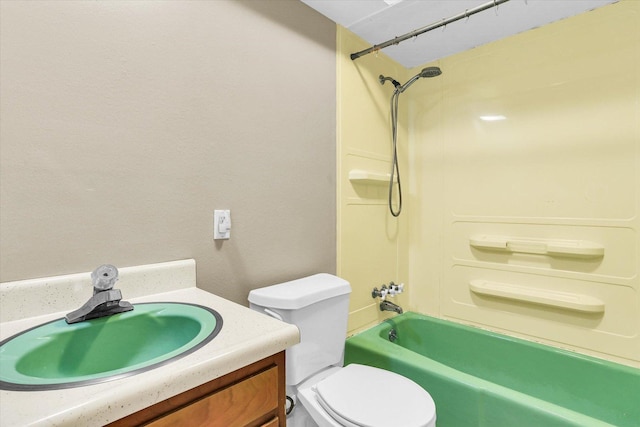 full bathroom with toilet, vanity, and shower / tub combination