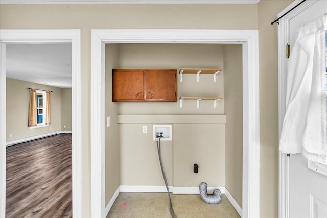 laundry area with washer hookup and a baseboard heating unit