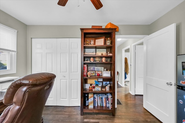 office area featuring ceiling fan and dark wood-type flooring