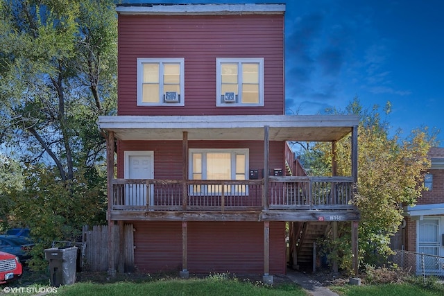 7505 S Emerald Ave, Chicago, IL 60620 - view of front of house featuring stairway and covered porch