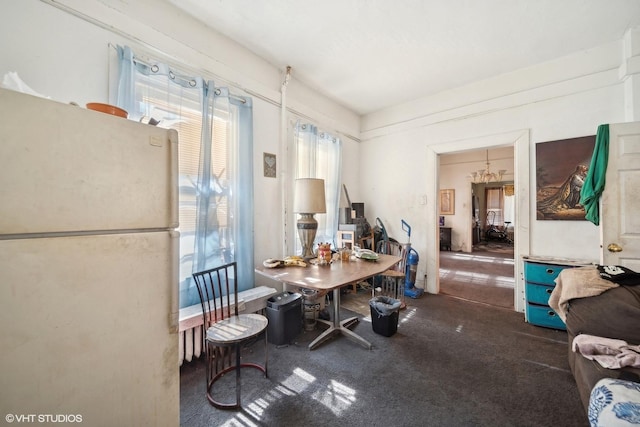 7505 S Emerald Ave, Chicago, IL 60620 - dining space featuring carpet floors