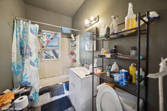 7505 S Emerald Ave, Chicago, IL 60620 - bathroom featuring vanity, toilet, and a shower with shower curtain