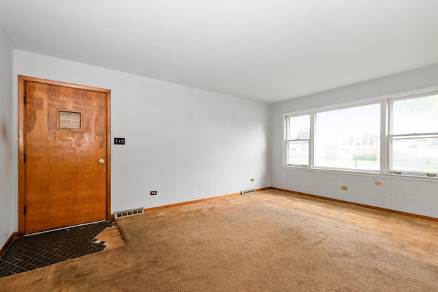 unfurnished room with carpet