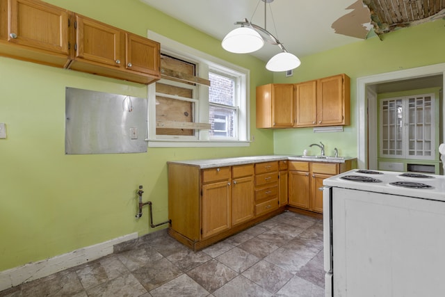 kitchen with sink, decorative light fixtures, and white range with electric stovetop