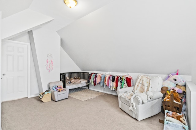 carpeted bedroom featuring vaulted ceiling