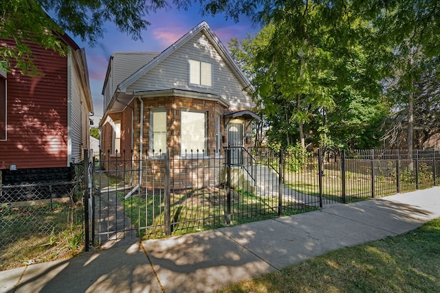 view of front of home featuring a lawn